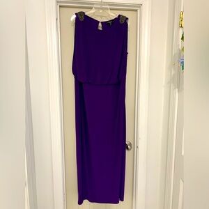 Size 14W. Beautiful long gown. Beading on the shoulders. Worn once.